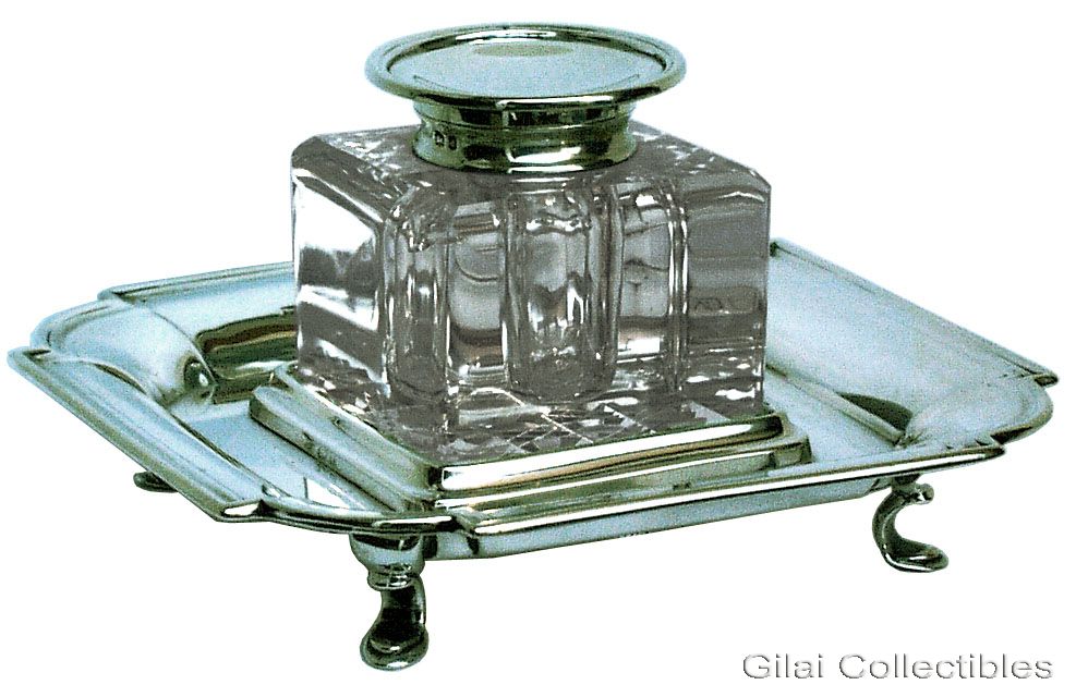 A 19th Century Cut Glass Inkwell On Silver Stand. - click to enlarge.