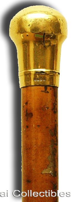English Decorative Cane From 1889 With18 Ct Gold Knob Handle and Malacca Shaft. - click to enlarge.