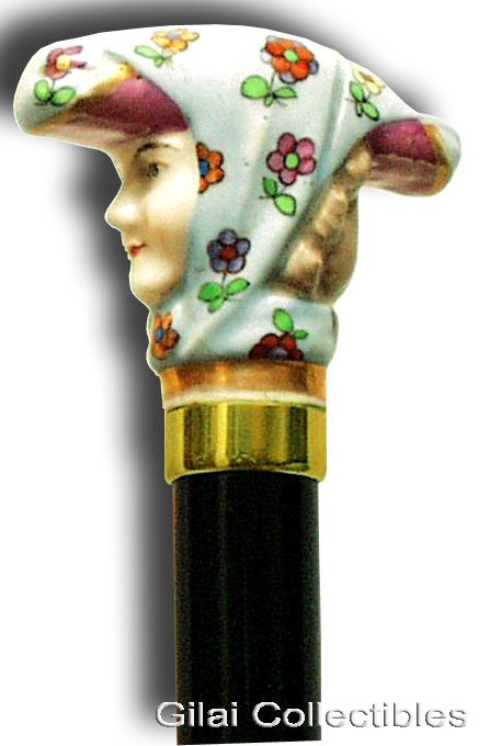 19th Century German Decorative Lady’s Dress Cane With Meissen Porcelain Handle And Gilt Collar. - click to enlarge.