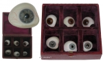 Six Prosthetic Eyes in Box.