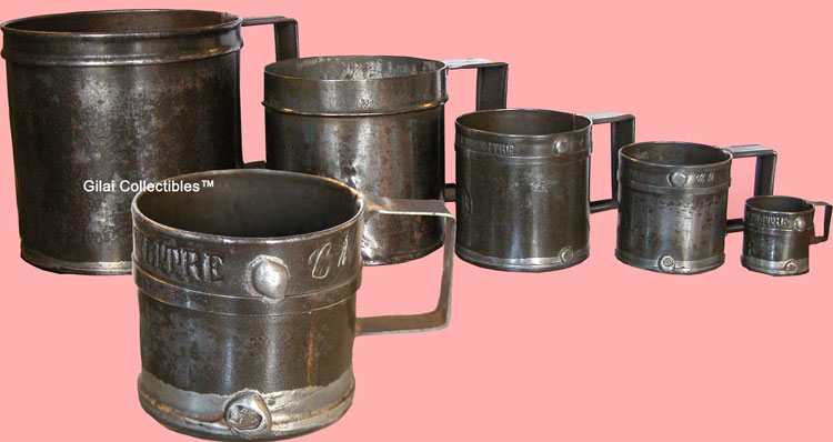 Set of 5 Tin Grain Measures - click to enlarge.
