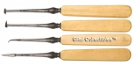 Set Of Four Dental Scaling Instruments With Ivory Handles
